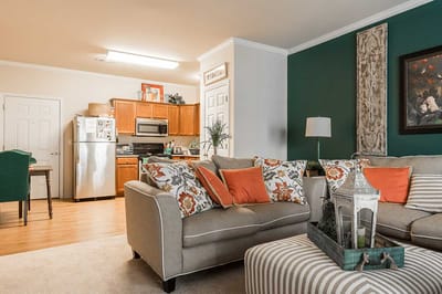 Warm and inviting living area with kitchen access