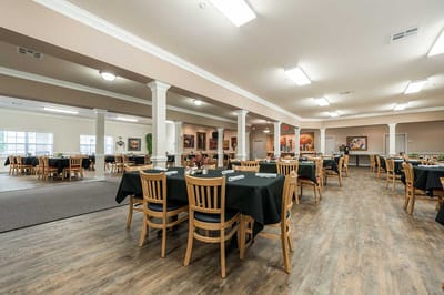 Interior view of a dining room set up for meals