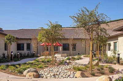 Outdoor area with garden and seating at the facility