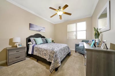 Cozy bedroom with bed and seating area