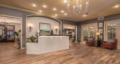 Lobby area with reception desk and seating