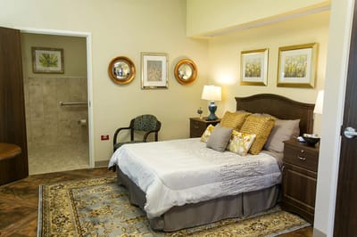 Cozy private room with bed and decor