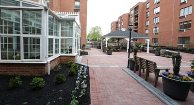Outdoor garden area with walking paths and seating