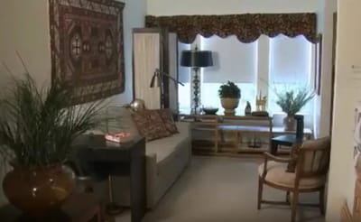 Cozy interior room with a seating area and plants
