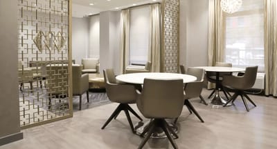 Modern interior common area with seating and tables