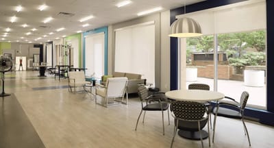 Bright common area with seating and natural light