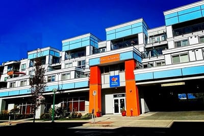 Bright exterior view of The Poppy Residences facility