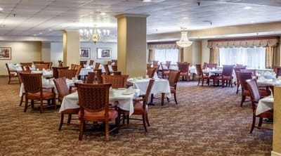 Dining room with tables neatly set for meals