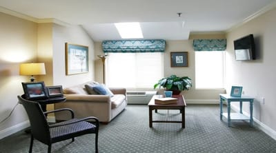 Bright living room setup in an assisted living facility