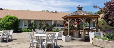 Outdoor patio area with gazebo and seating