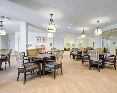 Spacious dining area with tables and chairs