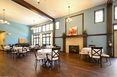 Bright dining room with tables and chairs