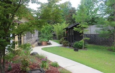 Pathway through a landscaped outdoor garden area