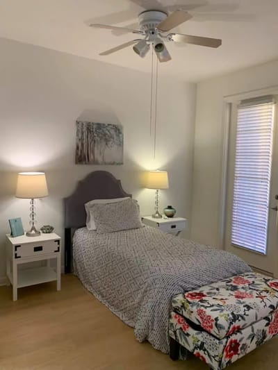 Cozy private bedroom with natural light