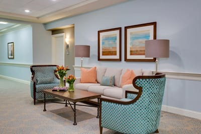 Cozy common area with comfortable seating and artwork