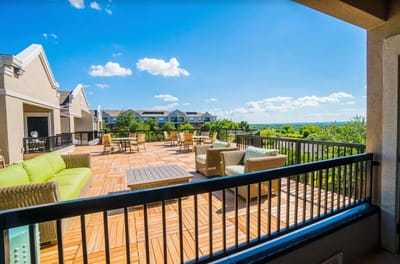 Sunny outdoor space with seating and tables