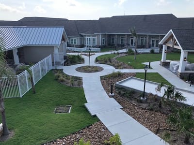 Outdoor garden walkway with landscaped areas
