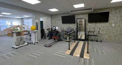 Interior view of a therapy room with equipment