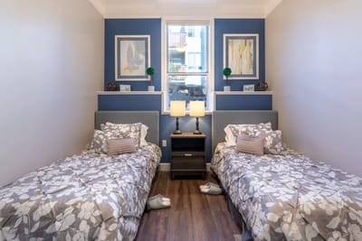 Bright interior of a shared resident bedroom