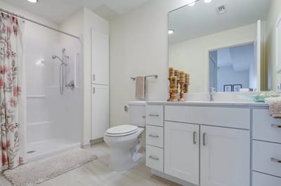 Bright, modern bathroom with floral accents