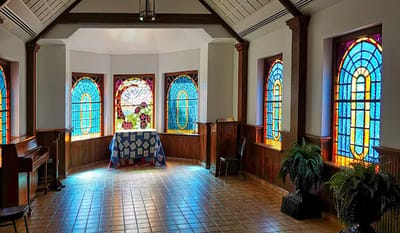 Bright interior room with stained glass windows