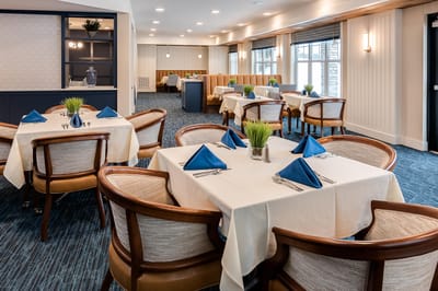 Elegant dining room setup with table and chairs
