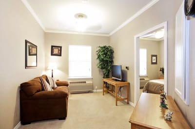 Cozy interior room with a couch and TV