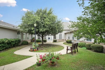 Outdoor garden area with pathways and seating