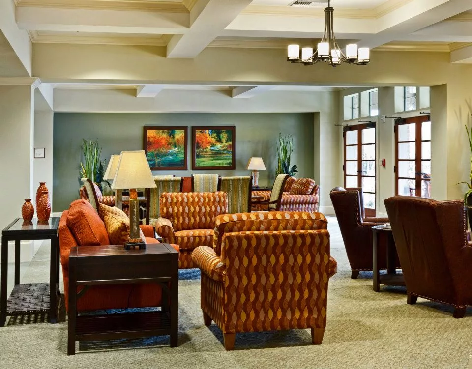 Cozy common area with comfortable seating and artwork