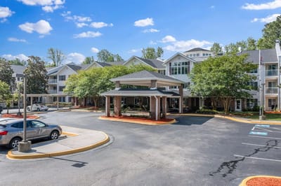 Exterior view of the facility entrance and parking area