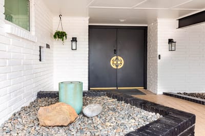 Entrance to a senior living facility with a welcoming decor