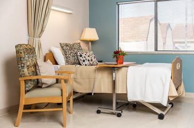 Cozy resident room with comfortable furniture and natural light