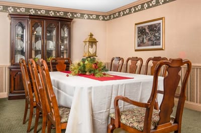 Cozy dining room set for a festive meal