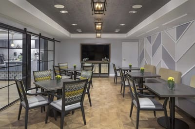 Bright dining room with modern decor and seating