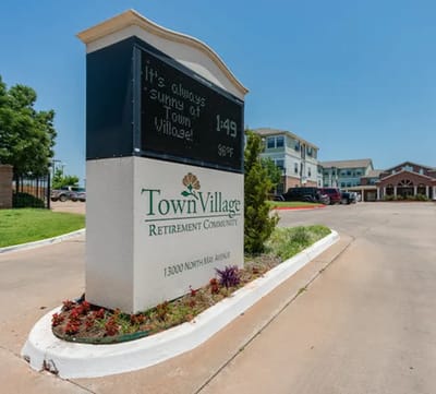 Signage at the entrance of Town Village Retirement Community