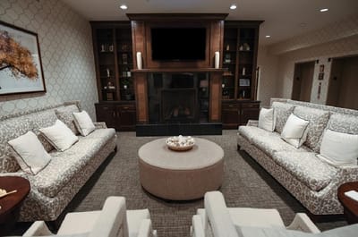Cozy common area with comfortable seating and fireplace