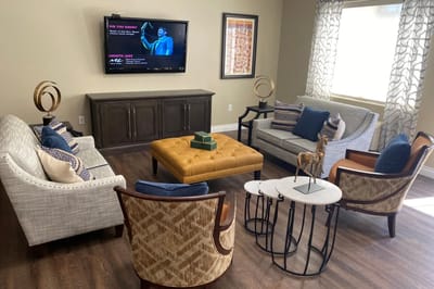 A cozy common area with seating and décor