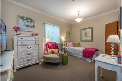 Bright, cozy resident room with comfortable furnishings