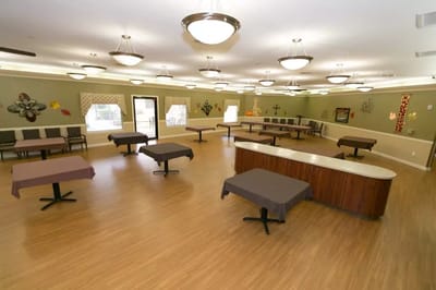 Bright and spacious common area with tables