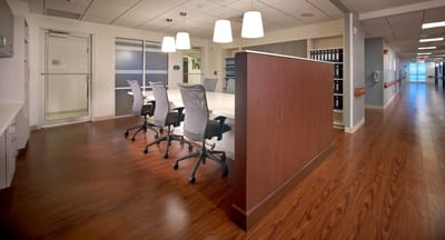Interior view of a modern meeting area with chairs and tables