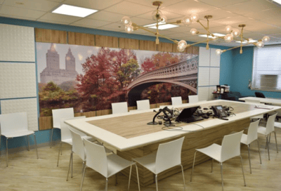Interior view of a common area with decorative mural