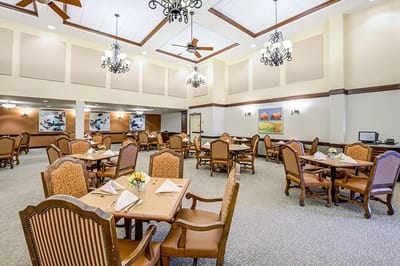 Dining room with tables set for a meal