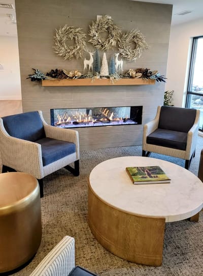 Cozy common area with modern decor and fireplace
