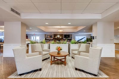 Common area with seating and decorative flowers