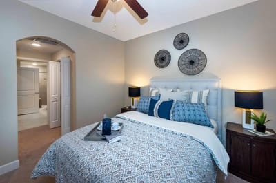 Stylish resident room with cozy decor and amenities