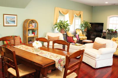 Cozy common area with comfortable seating and plants