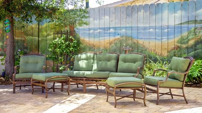 Outdoor seating area with mural backdrop