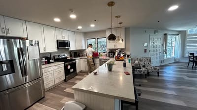 Staff preparing food in a modern kitchen