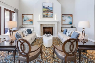 Bright and inviting common area with seating and art