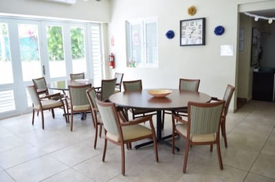Bright dining area with tables and chairs